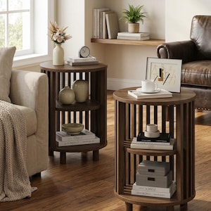 May include: Two dark brown wooden side tables with a slatted design, each with two shelves. The tables are adorned with decorative items like vases, books, and small boxes, creating a cozy living room setting.