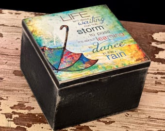 Box with Inspirational Art – "Life Isn't About Waiting for the Storm to pass .  . . " Quote