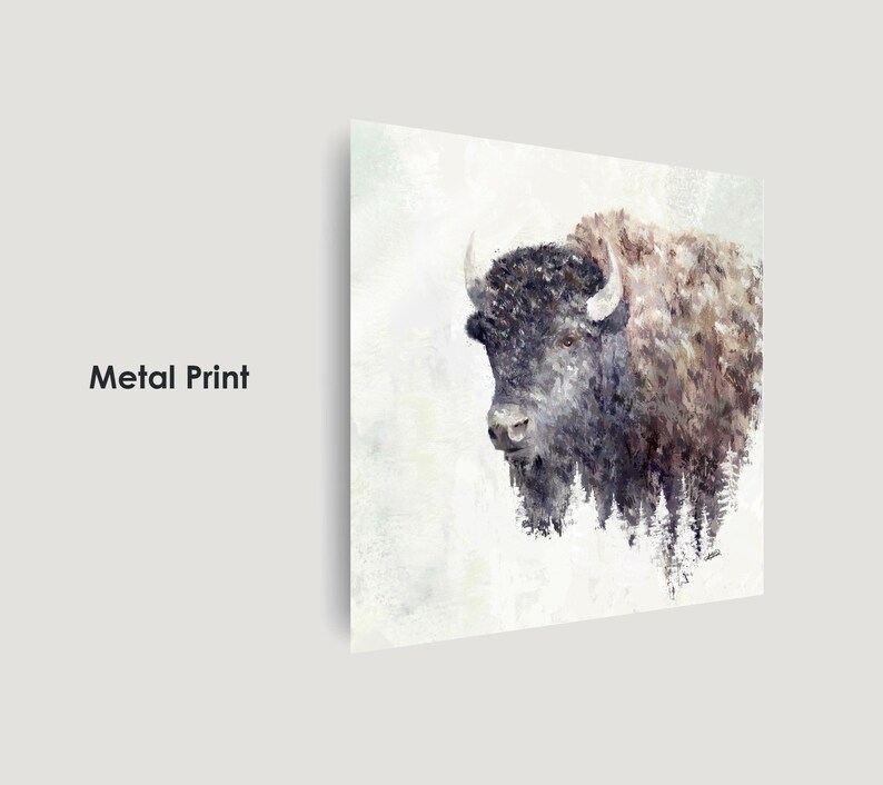 May include: A watercolor painting of a bison with a white background. The bison is facing left and has a dark brown body with a white face. The painting has a soft, dreamy feel.