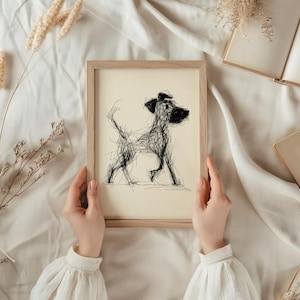 May include: A framed sketch of a dog in a light wood frame. The dog is drawn in black lines on a cream-colored background. The artwork has a whimsical, hand-drawn quality, suitable for home decor.