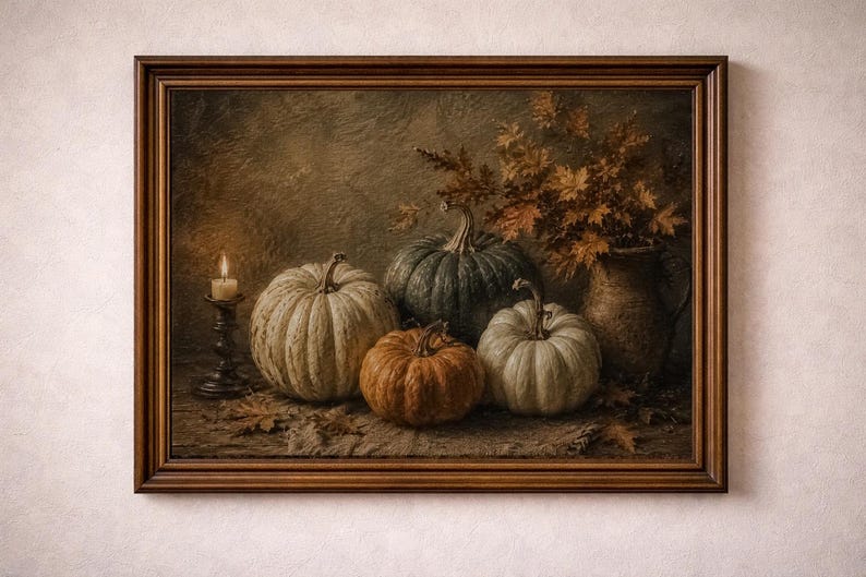 May include: A framed oil painting depicting a still life scene with three pumpkins in shades of white, green, and orange, a lit candle in a dark metal holder, and a ceramic pitcher filled with dried autumn leaves, all set against a dark background.