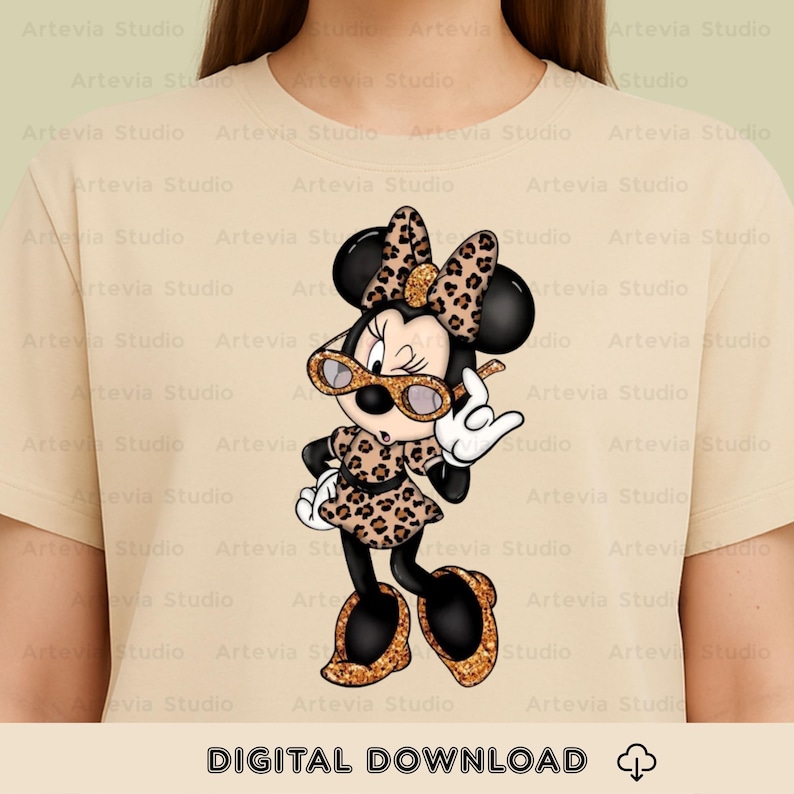 May include: A beige t-shirt with a cartoon Minnie Mouse design. Minnie is wearing a leopard print outfit and sunglasses, making a rock-and-roll hand gesture. The words "DIGITAL DOWNLOAD" are at the bottom of the image.