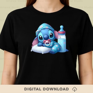 May include: Black t-shirt featuring a blue cartoon character wearing a floral sleep cap and pajamas, holding a pacifier, and resting on a pillow. A baby bottle with pink and blue accents is next to the character. The text "DIGITAL DOWNLOAD" is at the bottom.