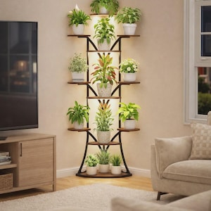 May include: A tall, black metal and wood plant stand with multiple shelves, each holding potted plants. The stand is illuminated from behind, creating a warm glow. The plants vary in size and type, adding a touch of nature to the room.