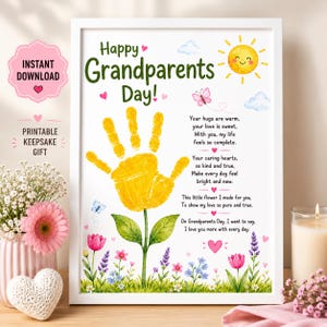 May include: A framed print for Grandparents Day featuring a yellow handprint shaped like a flower, a smiling sun, butterflies, and a poem. The text reads: Happy Grandparents Day! Your hugs are warm, your love is sweet, With you, my life feels so complete.