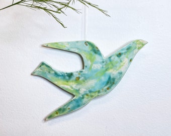 Bird hanging decoration, hand crafted ceramic, glazed in blues and greens