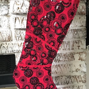 Red wool stocking with black sequins