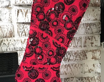 Red wool stocking with black sequins