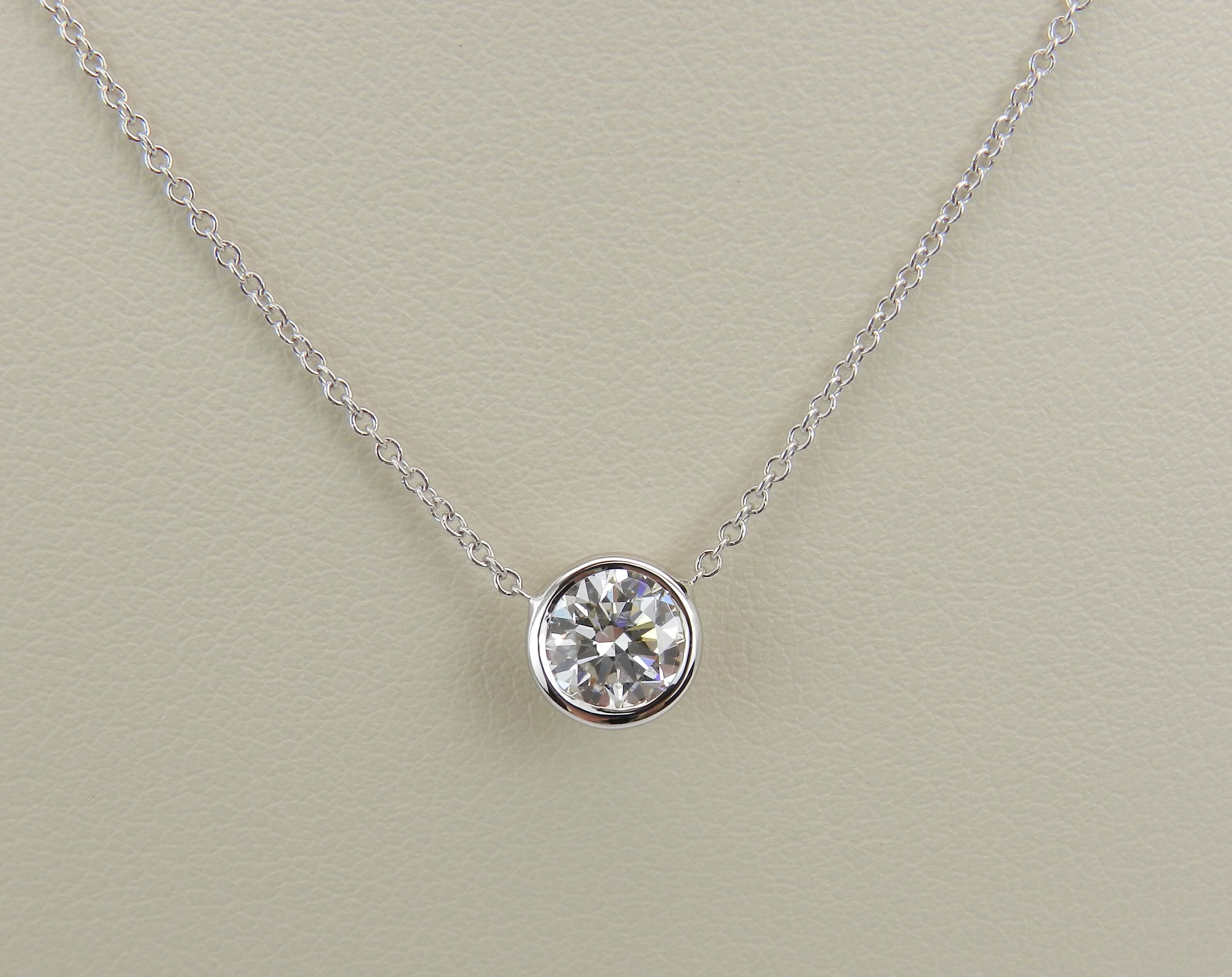 Floating bezel diamond necklace discount