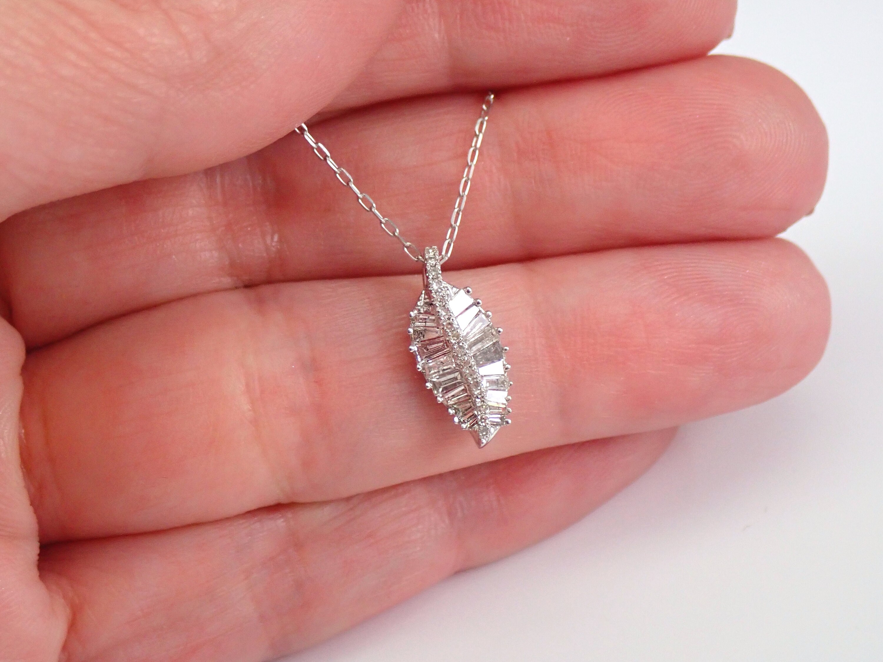 Designer Stainless Steel Simulated Diamond Feather Necklace in Silver  Auction (0040-2549495) | Grays Australia