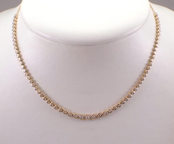 14K Yellow Gold Diamond Tennis Necklace: Graduated Riviera Bezel Setting with Extension