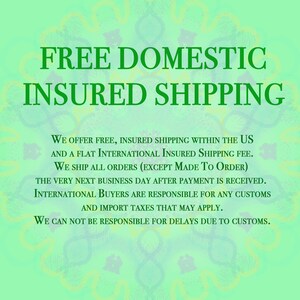 May include: Image with the text "FREE DOMESTIC INSURED SHIPPING" in large green letters. Below, smaller text details free shipping within the US and a flat international fee. It also mentions shipping details and buyer responsibilities.
