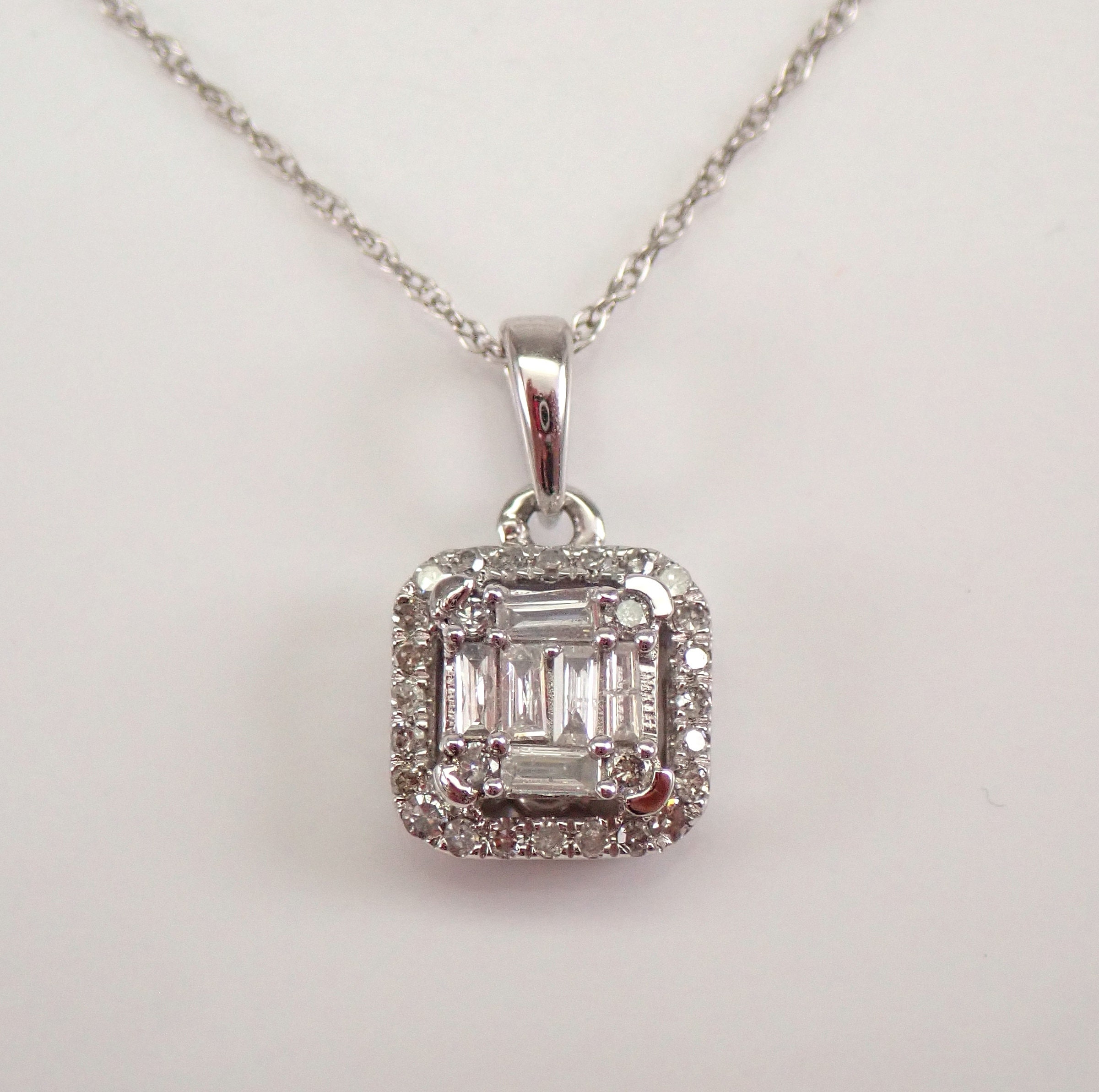 Emerald Cut and Round Diamond Pendant