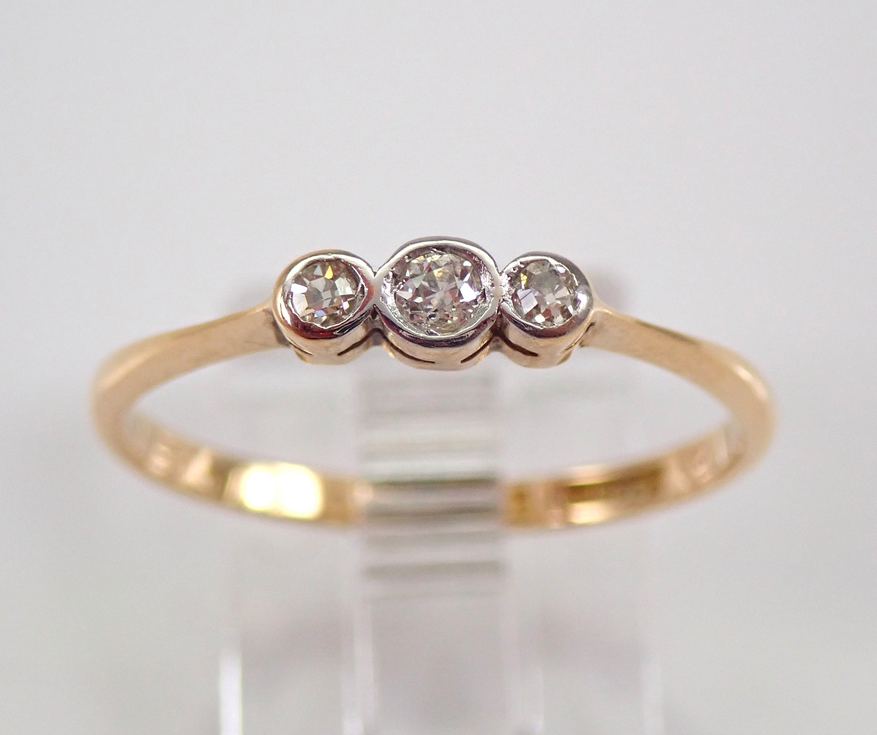 18kt white gold three cluster diamond ring