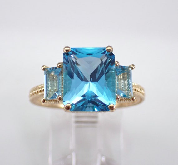 Radiant Cut Blue Topaz Engagement Ring - 14K Yellow Gold Three Stone Setting - GalaxyGems Bridal Gemstone Jewelry Gift