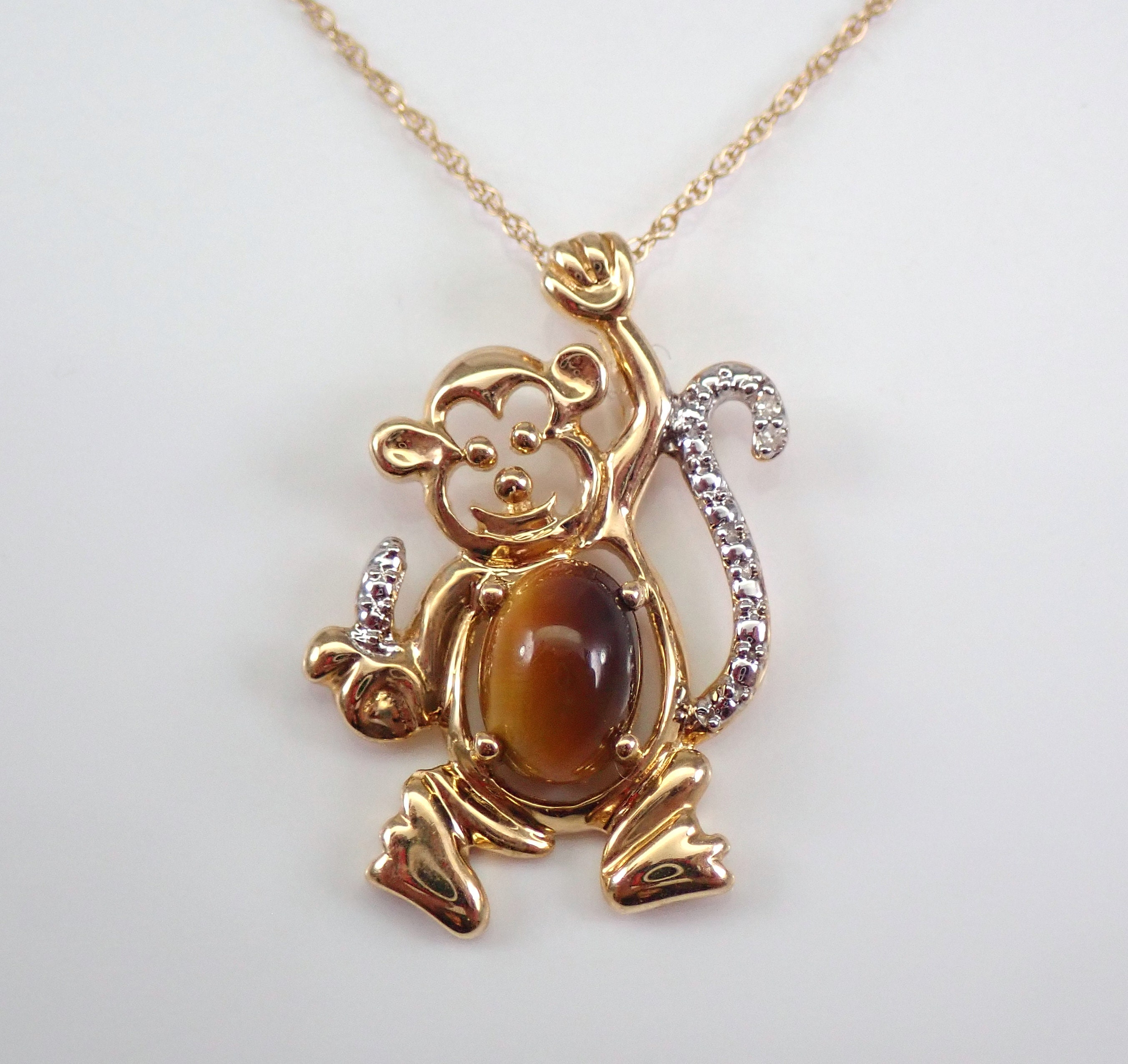 Animal Kingdom High Polish 14k Yellow Gold Full Body Tiger Pendant :  Clothing, Shoes & Jewelry - Amazon.com