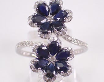 14K White Gold Sapphire and Diamond Flower Ring: Diamond Cluster Crossover Bypass Band