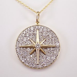 14 kt geelgouden diamanten ketting - hanger en ketting hemelse poolster - grote bedel kompasroos atlassymbool