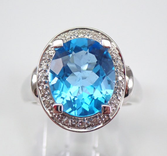 Blue Topaz and Diamond Halo Ring - 14K White Gold Tall Engagement Setting - Hidden Baguette Tanzanite Channel Set