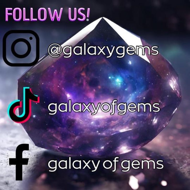 May include: A large, faceted gemstone with a galaxy-like interior, featuring shades of purple, blue, and white. The text "FOLLOW US!" is at the top, with social media icons and usernames: Instagram, TikTok, and Facebook.