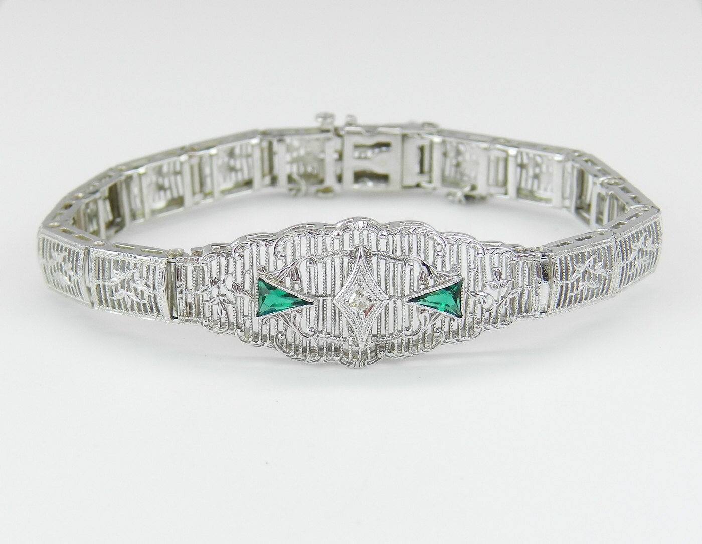 Antique Art Deco White Gold Diamond and Emerald Filigree Bracelet Circa