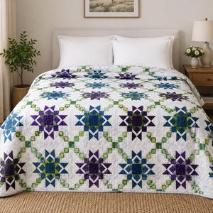 May include: A bed quilt featuring a repeating star pattern in shades of deep purple, teal, and lime green on a white background. The design includes interconnected geometric shapes and a light blue mottled texture across the white fabric sections.