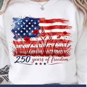 250 years of freedom American flag wildflower sublimation design shown printed on a white crewneck t shirt.