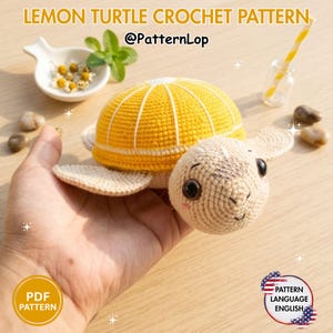 May include: A crochet turtle toy with a bright yellow shell resembling a lemon slice, featuring white stitched details, a beige head with dark eyes, and small flippers. The text reads LEMON TURTLE CROCHET PATTERN, @PatternLop, PDF PATTERN, and PATTERN LANGUAGE ENGLISH.
