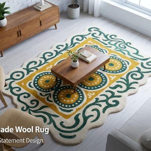 May include: A rectangular wool rug with a scalloped edge featuring a cream background, a mustard yellow central border, and dark green swirling patterns. The design includes three circular motifs with yellow centers and dark green borders.