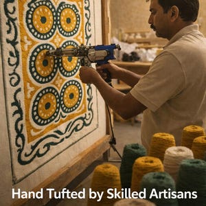 Indian artisan making hand tufted wool rug using tufting gun, workshop scene with yarn cones showing handmade craftsmanship and production process