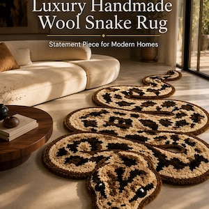 May include: A handmade wool snake rug in brown, tan, and black, with the text "Luxury Handmade Wool Snake Rug" and "Statement Piece for Modern Homes". The rug is designed to resemble a snake and is placed on a light-coloured floor.
