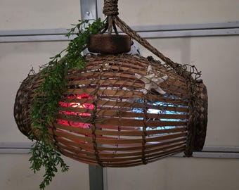 Fishtrap tiki bar lamp with lighted puffer fish
