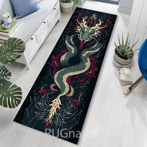 May include: A long, rectangular rug with a dragon design. The dragon is rendered in green, yellow, and red hues, set against a black backdrop. The rug incorporates floral motifs and detailed patterns, offering a visually captivating aesthetic for home decor.