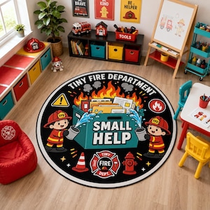 May include: A round black area rug featuring a colorful graphic of two cartoon firefighters spraying water on a burning box. The text reads TINY FIRE DEPARTMENT and SMALL HELP. The design includes a fire hydrant, a traffic cone, and a fire badge.