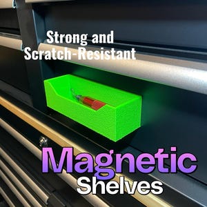 May include: A bright green magnetic shelf is mounted on a black surface. The shelf holds a red and silver tool. Text on the image reads "Strong and Scratch-Resistant" and "Magnetic Shelves".