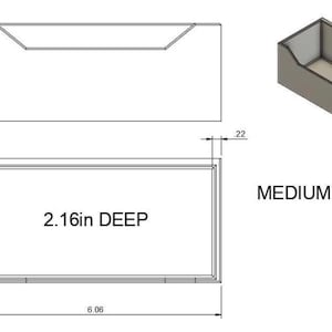 May include: Technical drawing of a medium-sized rectangular container with dimensions labeled in inches. The container is 6.06 inches long, 2.36 inches high, and 2.16 inches deep. The side view shows a recessed top.
