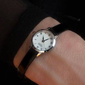 Mini-montre vintage noire et argentée