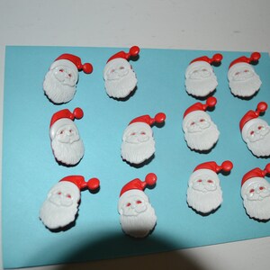 Santa Claus buttons. Set of 12