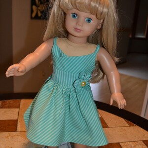 Striped dress, bow tie shoes, and hair bow for 18 inch doll