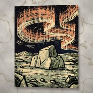May include: A rectangular canvas print featuring a stylized illustration of a large, angular rock formation in a desert landscape under a dark night sky filled with a vibrant, swirling orange and cream-colored aurora borealis.