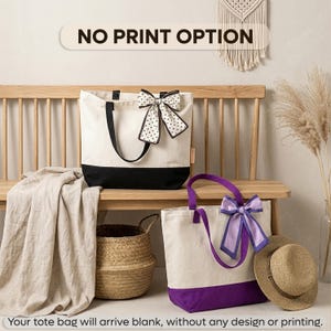 two tote bags with bows, one white and one purple, placed on a wooden bench. There is a "NO PRINT OPTION" sign above the bags, indicating that the bags will arrive blank without any design or printing.