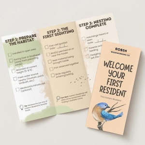 May include: A brochure with the text "WELCOME YOUR FIRST RESIDENT" and a watercolor illustration of an Eastern Bluebird. The brochure is open, displaying steps for preparing a habitat and observing the bird.