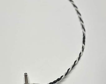 Cabo de alto-falante estilo Fender vintage, conector pancake de 1/4" em ângulo reto, extremidades desencapadas (terminais de pá de 0,205" disponíveis), 18 AWG, preto/branco