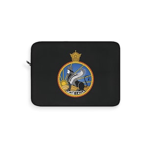 May include: Black laptop sleeve featuring a circular emblem with a winged lion, sun, and crown design. The emblem is in shades of gold, blue, and black. The sleeve has a zipper closure.