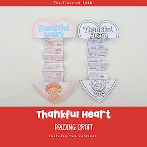Puede incluir: Dos manualidades plegables en forma de corazón de papel. Una está coloreada con un corazón azul claro y las palabras "Thankful Heart". La otra es un contorno en blanco y negro. Ambos tienen secciones para "Familia", "Comida", "Amigos", "Naturaleza", "Jesús" y "Vida".