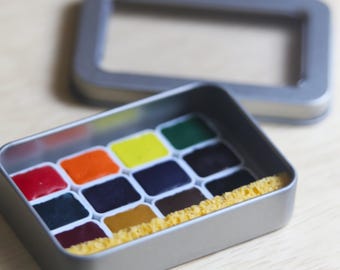 Meeden Watercolor Paint Set: 12 Colors in Travel Tin (Half Pans)