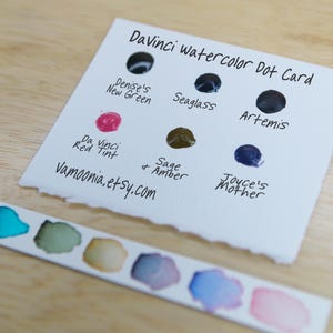 I handpicked these colors for their AMAZING performance!!! The Da Vinci Tropical Palette includes 6 half pans of the following colors: Sage & Amber, Joyce's Mother Violet, Denise's New Green, Artemis, Seaglass, Da Vinci Red Tint. Each is a professional-grade fine arts watercolor paint. I have these in stock, ready to ship in Half Pans, Quarter Pans, or dot cards.