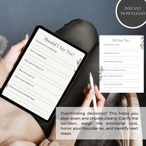 May include: A digital planner on a tablet with the text "Should I Say Yes?" and "If I Say No...". The planner includes prompts for decision-making and self-reflection. A stylus is also visible.