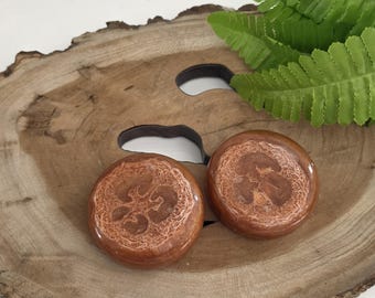 Sandalwood and luffa exfoliating soap bar with natural loofah and bronze shimmer