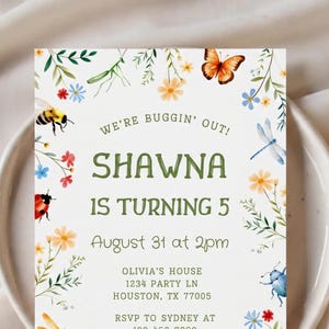 May include: A rectangular birthday invitation card with a white background, featuring a border of colorful watercolor insects and wildflowers. The text reads: WE'RE BUGGIN' OUT! SHAWNA IS TURNING 5, August 31 at 2pm, OLIVIA'S HOUSE, 1234 PARTY LN, HOUSTON, TX 77005, RSVP TO SYDNEY AT 123-456-7890.